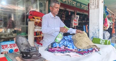 কয়লার আগুনে চলে সুকলালের সংসারের চাকা