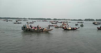 শ্যামনগরে নৌকায় নৌকায় প্রতিমা বিসর্জন